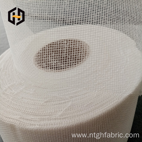 Custom roll of backing mesh fabric for pipe